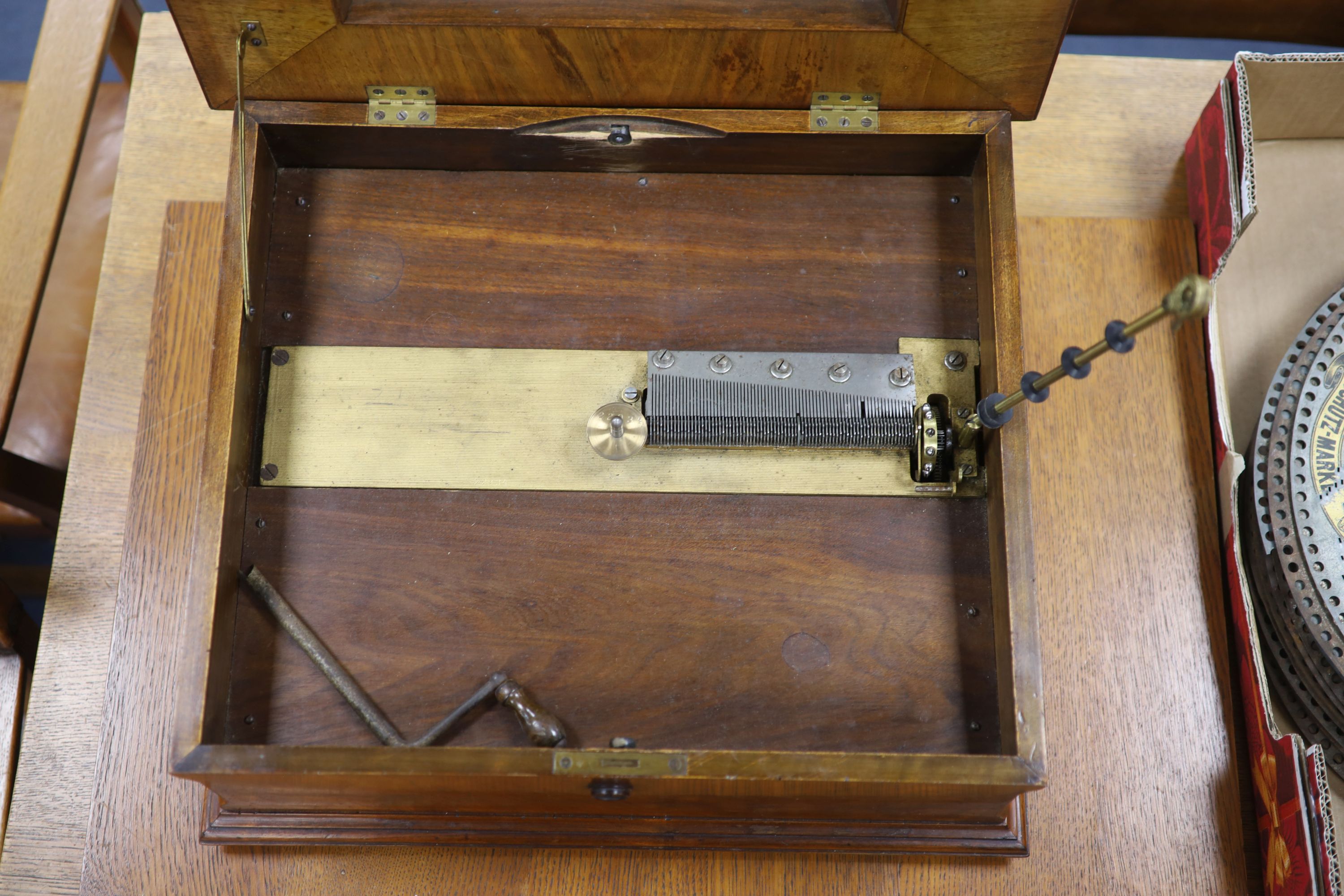 A large Polyphon walnut table top musical box, playing thirty 39.5cm discs